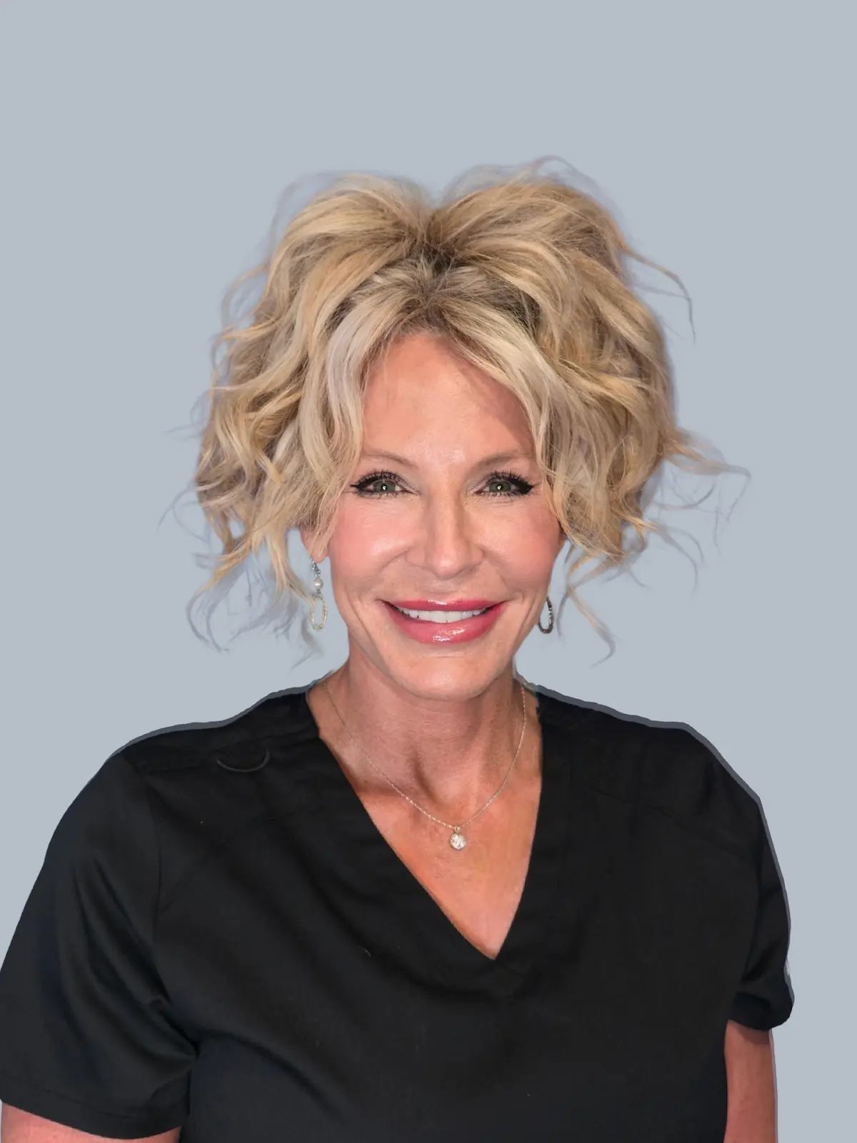 Happy woman smiling side profile.