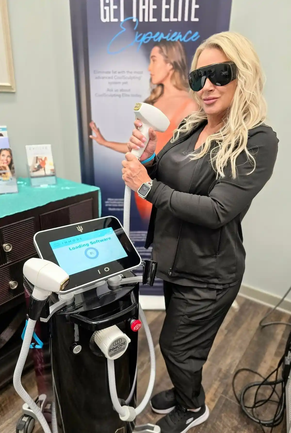 Provider performing laser hair removal treatment on a patient