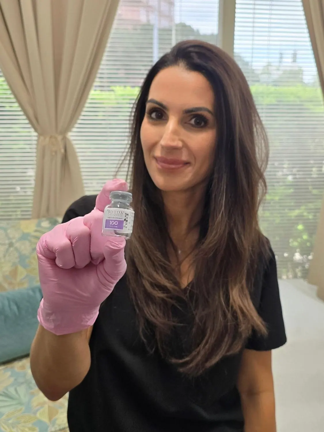 Aesthetic provider holding a vial of Botox Cosmetic at Vein and Cosmetic Center of Tampa Bay