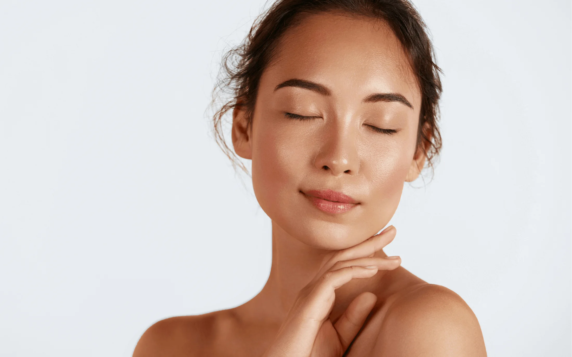 Woman with lifted, refreshed complexion after Fotona non-surgical facelift