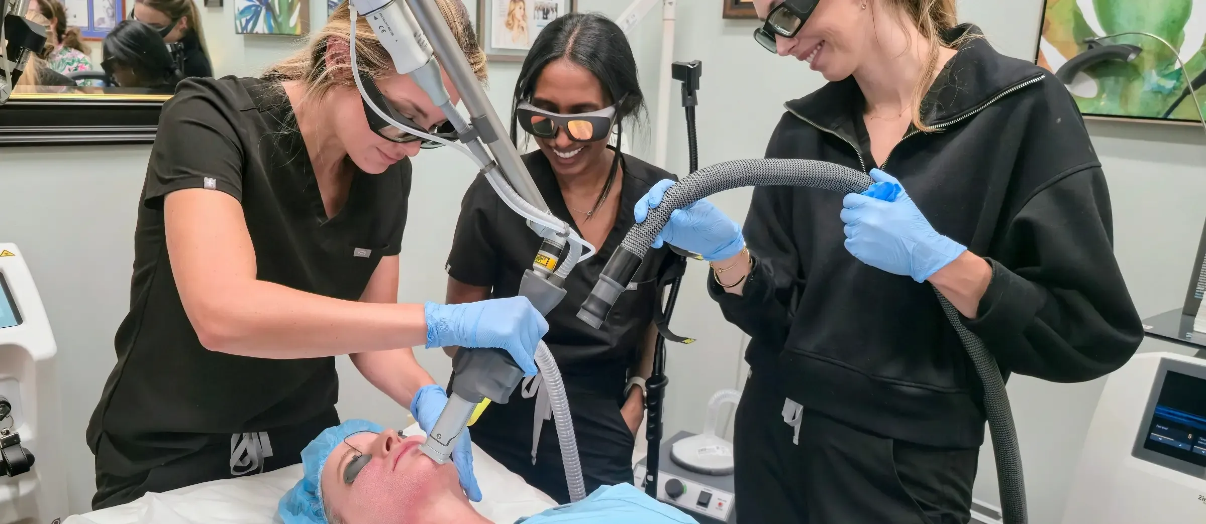 Vein & Cosmetic Center providers treating patient's skin with HELIX Fusion CO2 Skin Resurfacing & Tightening