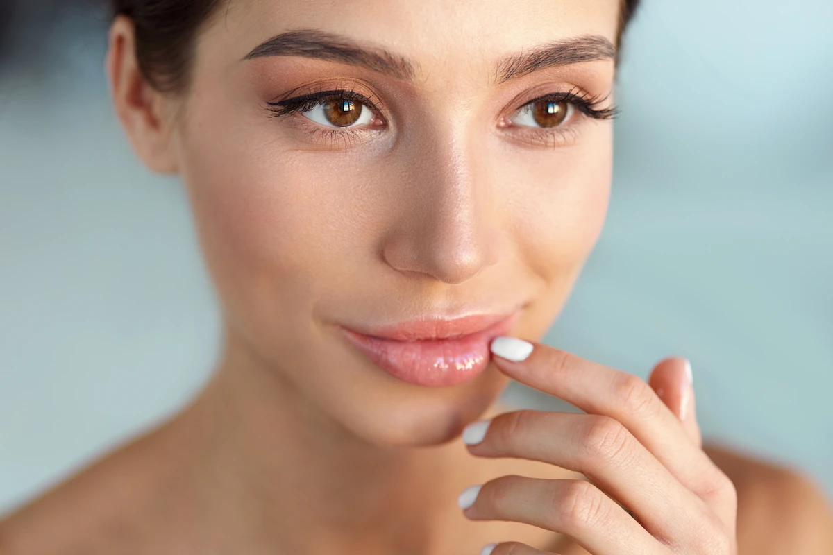Close-up of beautifully enhanced lips after lip augmentation treatment
