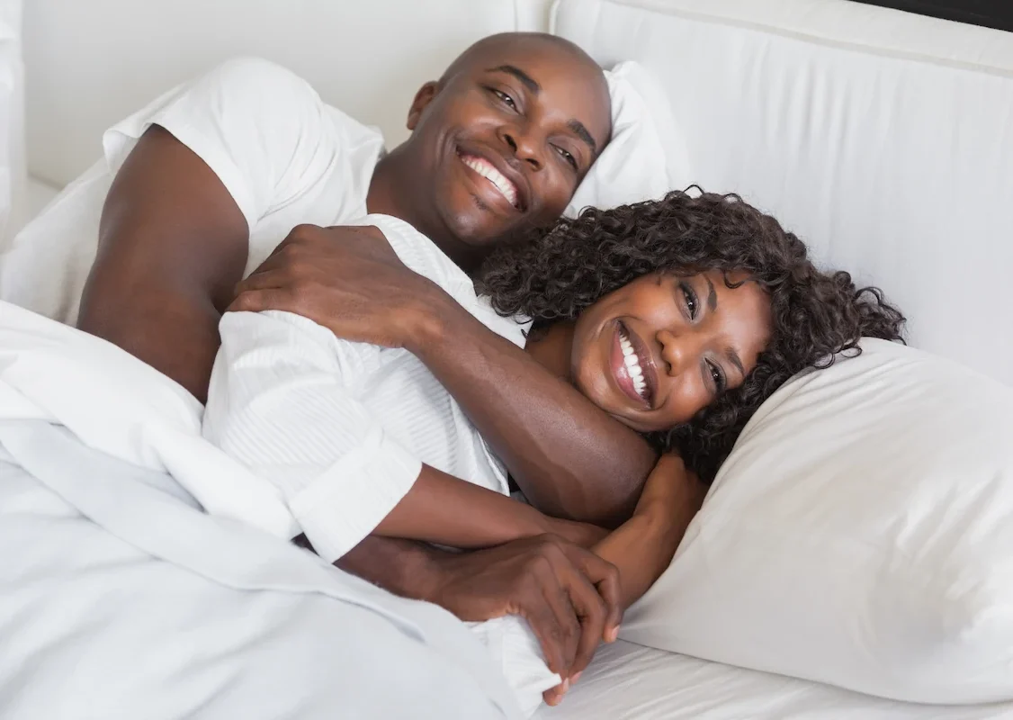 happy couple after snoring treatment and restful night