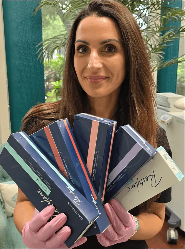 Vein center provider holding Restylane Fillers
