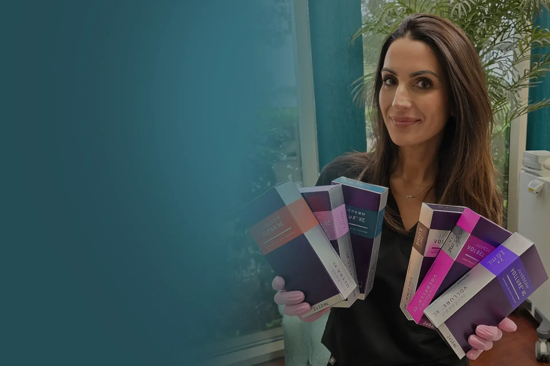 Vein center provider holding Restylane Fillers