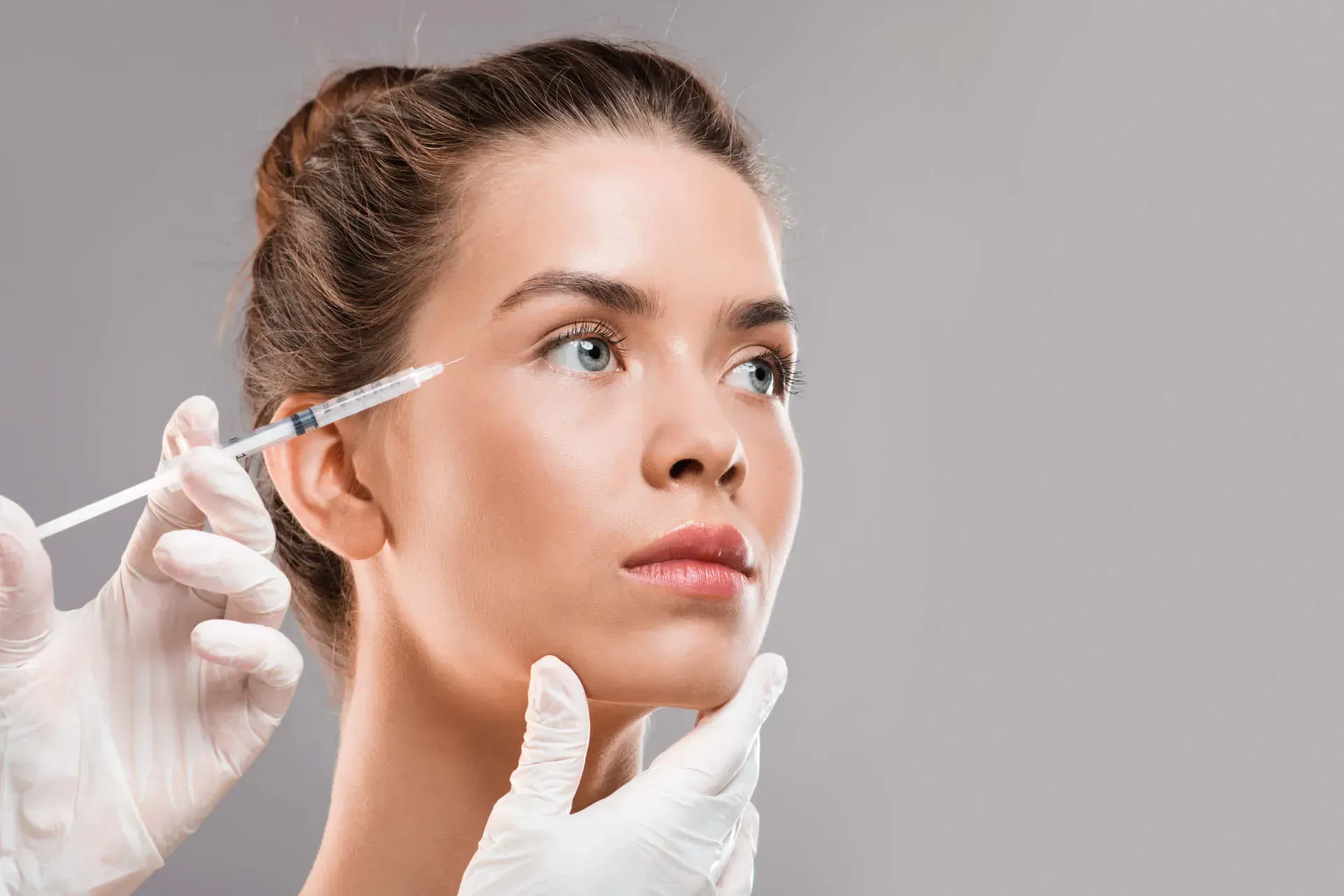 woman receiving BOTOX injection for wrinkle treatment