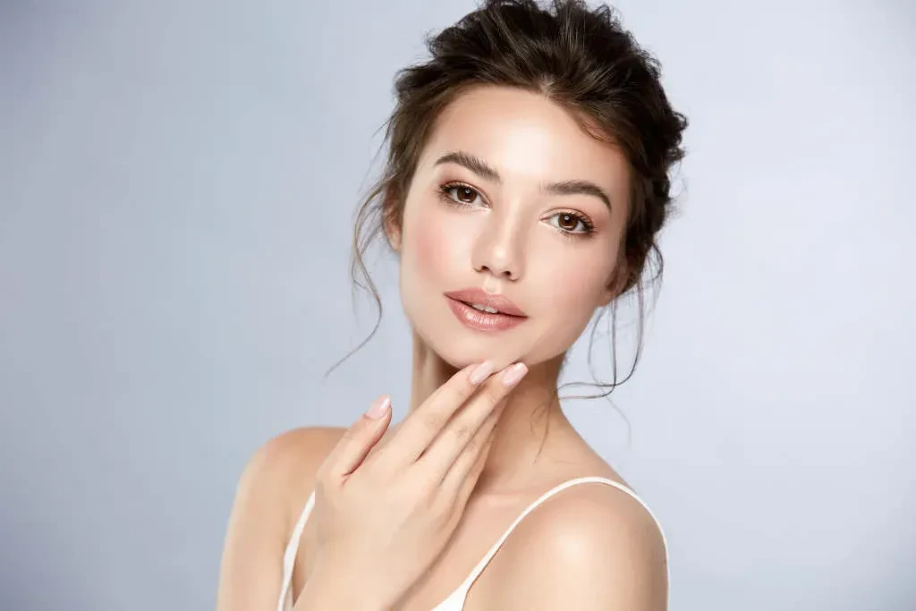 beautiful woman touching smooth skin
