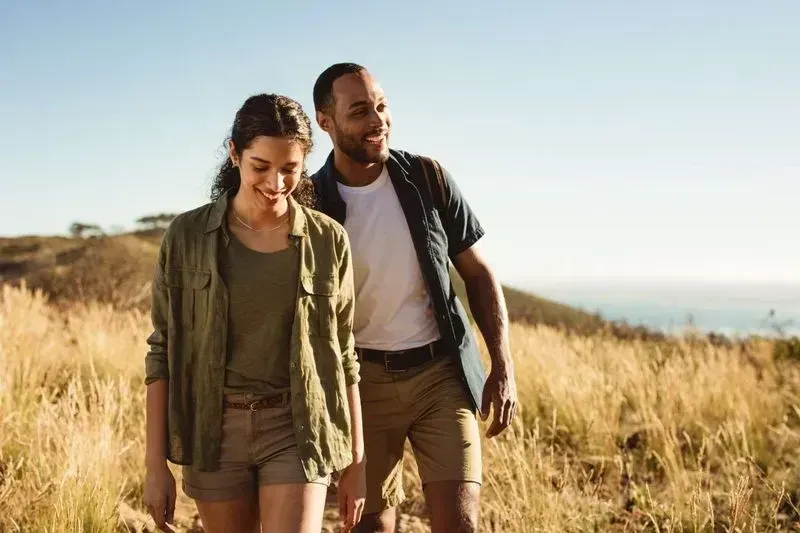 happy couple hiking together