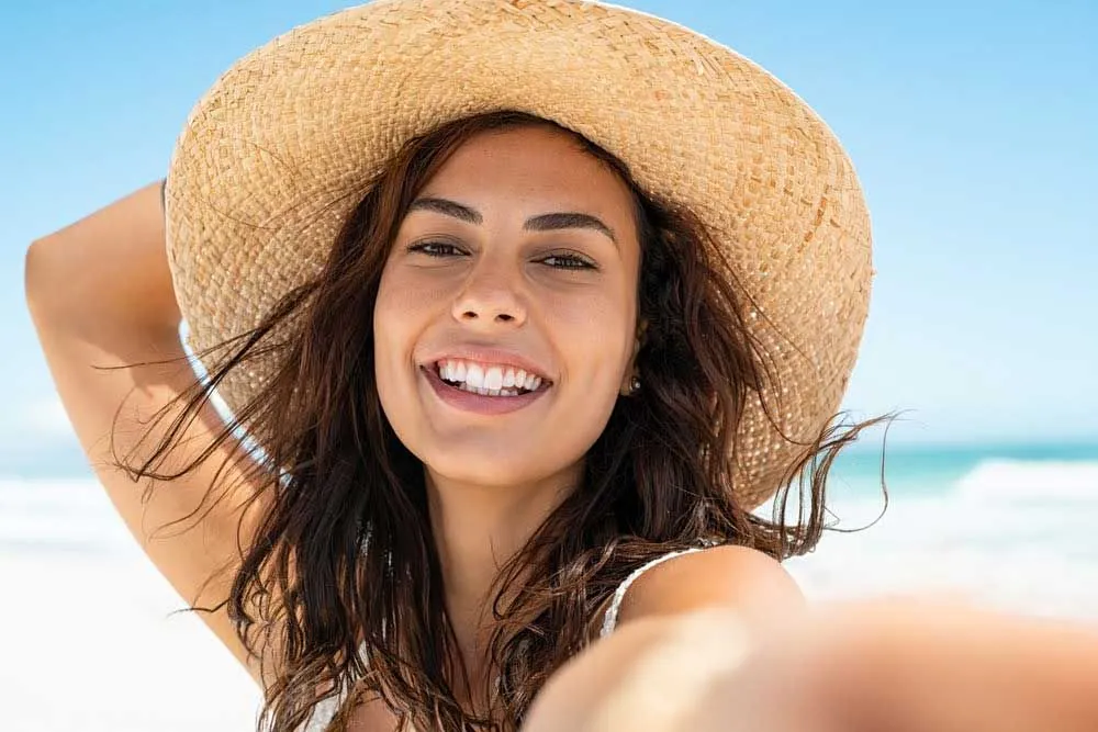 beautiful woman with glowing skin after hydrafacial treatment